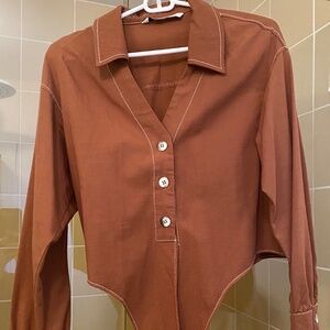 Rust colored Zara shirt